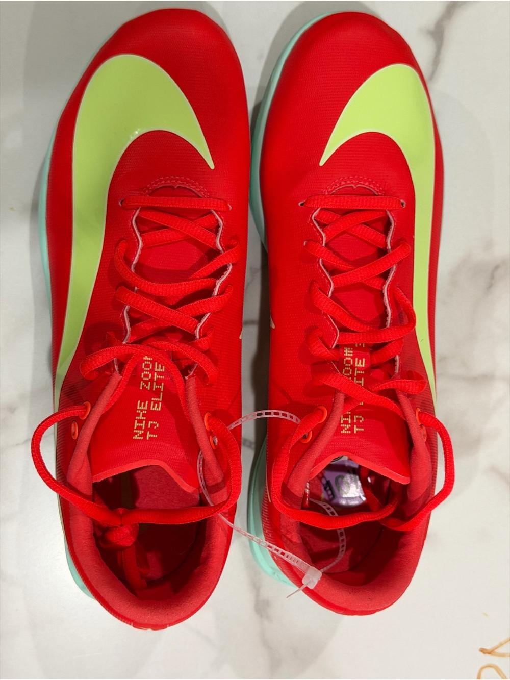 Nike Women’s Red Sneakers with Lime Swoosh and Mint Sole